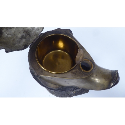 123 - An Austrian patinated bronze novelty desktop tobacco bowl, fashioned as a bulldog's head with a stud... 