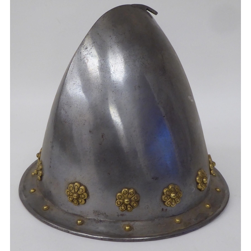 124 - Re-enactment armour, viz. a knight's helmet incorporating a visor; a breastplate with buckled straps... 