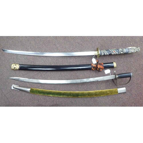 13 - A modern Japanese sword, the curved blade 28