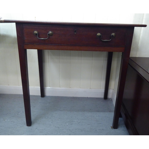 161 - An early 19thC mahogany side table, the overhanging top above a frieze drawer with twin brass bail h... 