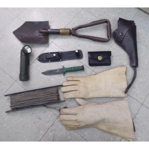 163 - Military and civil defence related equipment: to include stitched hide holsters and three similar ba... 