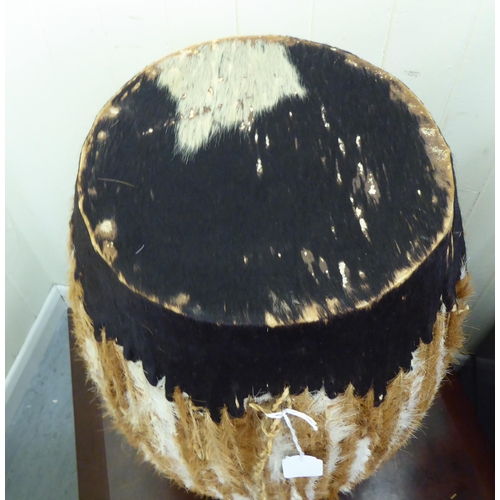 171 - A 20thC (probably African) tribal drum of barrel design  19