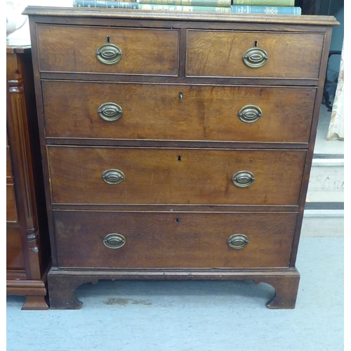 176 - A 19thC oak dressing chest with two short/three graduated long drawers and brass bail handles, raise... 