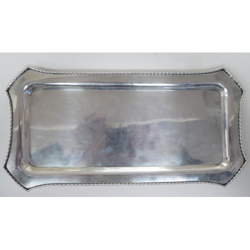 18 - Foreign silver coloured metal/white metal tableware  bearing various marks, viz. a rectangular, bead... 