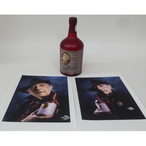 182 - A bottle of Quentin Crisp single malt Scotch Whisky  bears a signature on the label & two s... 