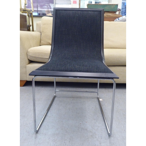 214 - A Kesterport home office desk chair, raised on a steel underframe 