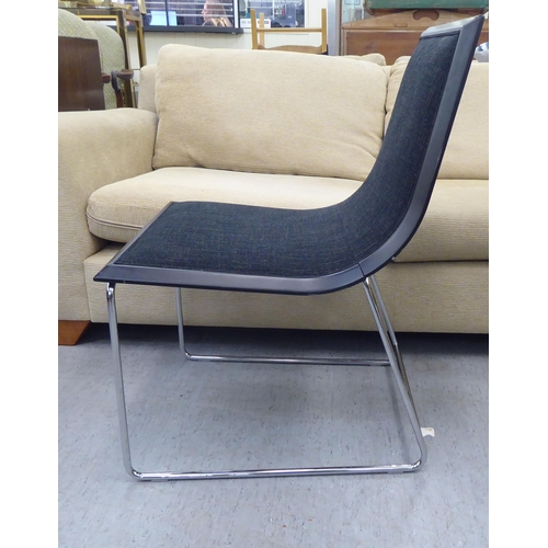 214 - A Kesterport home office desk chair, raised on a steel underframe 