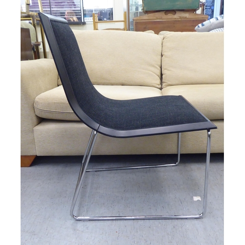 214 - A Kesterport home office desk chair, raised on a steel underframe 