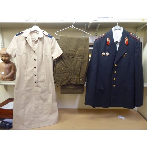 215 - Military uniforms: to include a Russian example (Please Note: this lot is subject to the statem... 