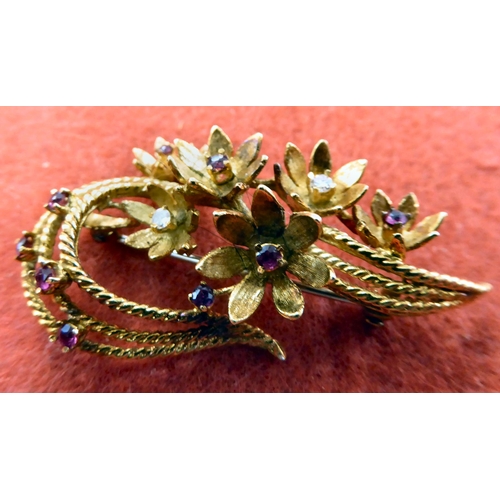 232 - A yellow metal floral spray design brooch, set with diamonds and rubies