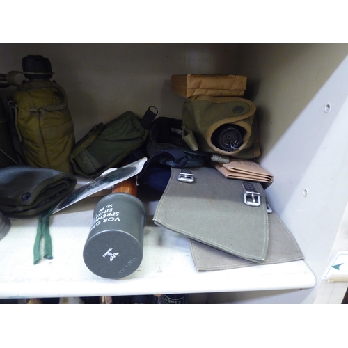 238 - Military related items: to include campaign canteen items; and an ammunition carrier(Please Note: th... 