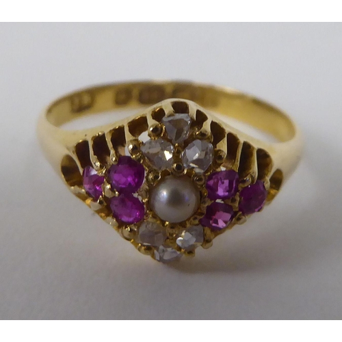 242 - A Victorian 18ct gold cluster ring, set with a pearl, diamonds and rubies  Birmingham 1876 ... 