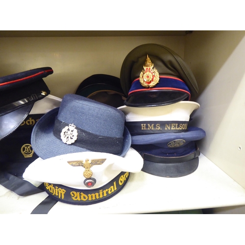 243 - Military and other, mainly 20thC headgear: to include peaked caps, berets and side caps(Please Note:... 