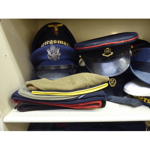 243 - Military and other, mainly 20thC headgear: to include peaked caps, berets and side caps(Please Note:... 