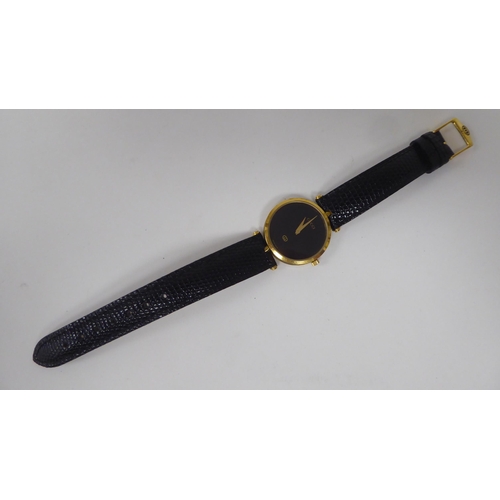 245 - A ladies Gucci black and yellow metal cased wristwatch, on a dedicated black lizard leather strap, b... 