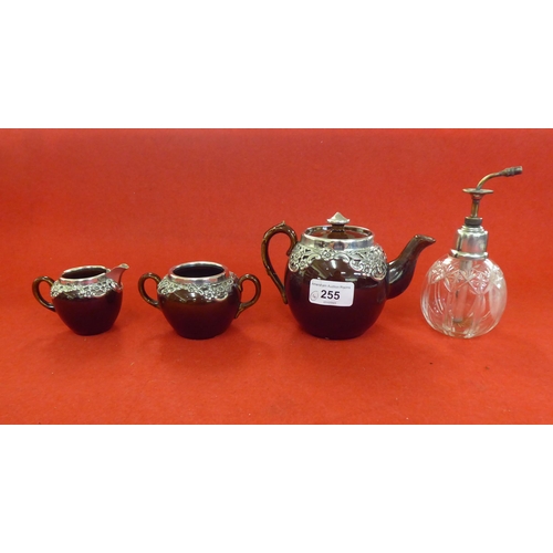 255 - Silver collectables: to include a three piece brown streaky glazed pottery tea set with silver mount... 