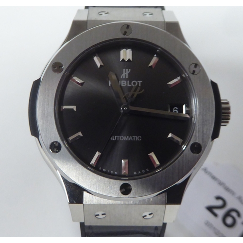 261 - A Hublot Fusion Racing Grey titanium cased wristwatch, the automatic movement faced by a baton dial,... 