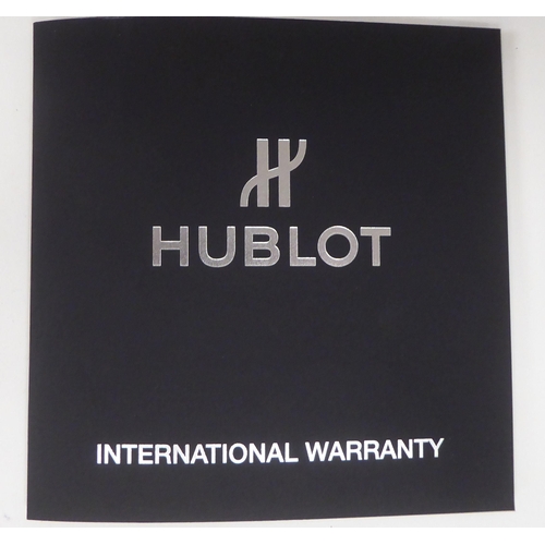 261 - A Hublot Fusion Racing Grey titanium cased wristwatch, the automatic movement faced by a baton dial,... 