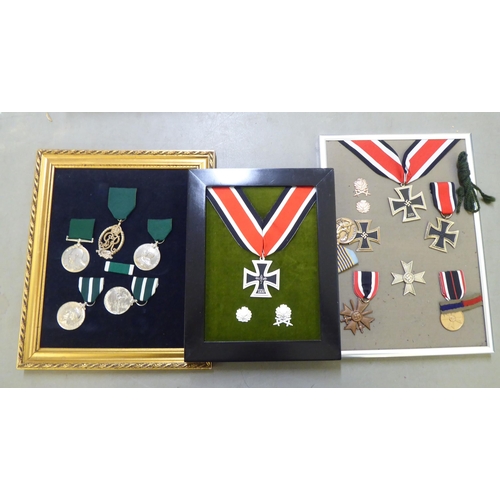 265 - Framed and loose military and associated medals and medallions, some copies: to include German Third... 