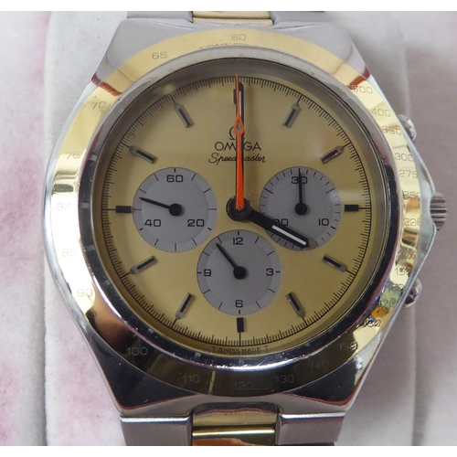 273 - An Omega Speedmaster Teutonic stainless steel cased and gilded bracelet wristwatch, faced by a baton... 