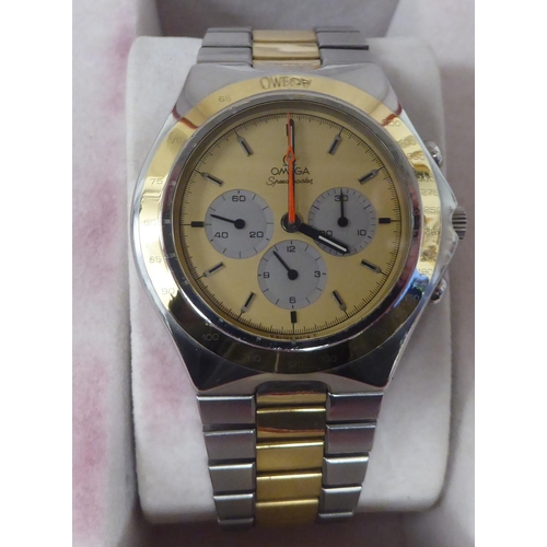 273 - An Omega Speedmaster Teutonic stainless steel cased and gilded bracelet wristwatch, faced by a baton... 