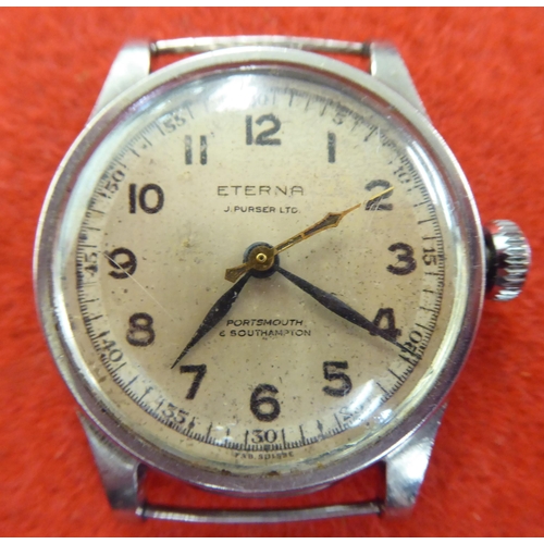 358 - A stainless steel cased Eterna watch, the movement faced by an Arabic dial