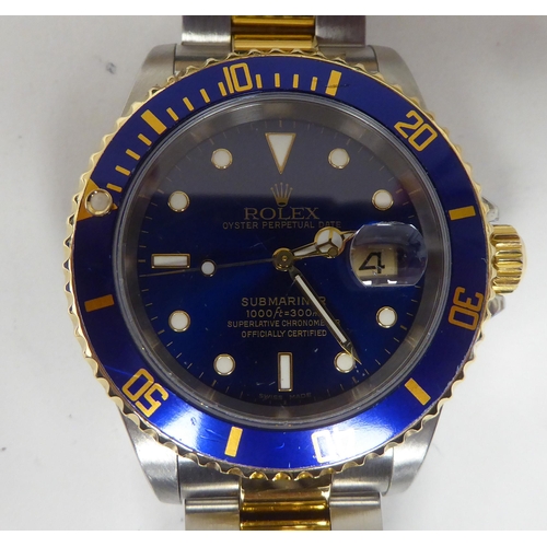 361 - A Rolex Submariner 16613, bi-coloured stainless steel cased chronometer, the blue dial with a rotati... 