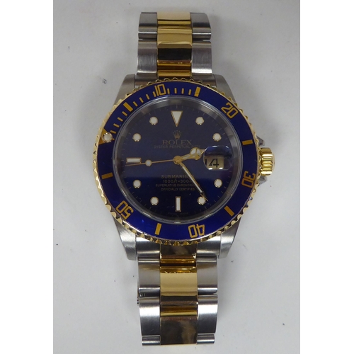 361 - A Rolex Submariner 16613, bi-coloured stainless steel cased chronometer, the blue dial with a rotati... 