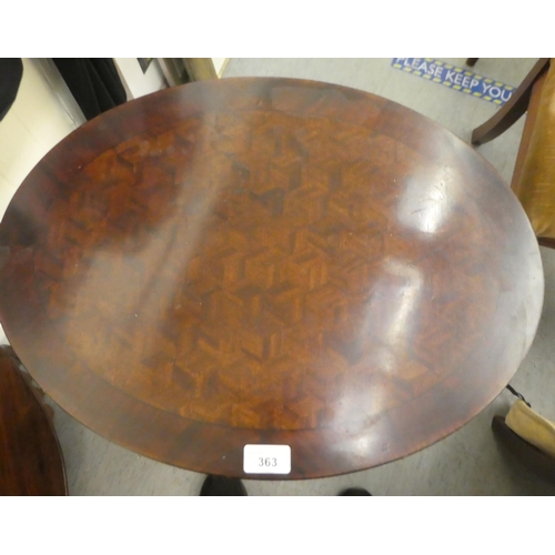 363 - A late 19thC crossbanded and parquetry mahogany oval table, raised on square, tapered legs and spade... 