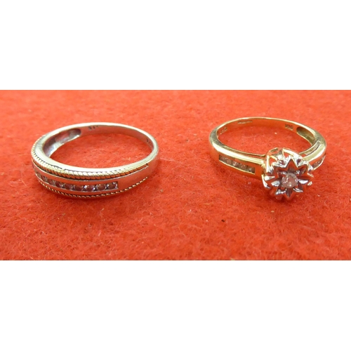 366 - A 9ct gold and diamond set half eternity ring; and another, solitaire with diamond shoulders