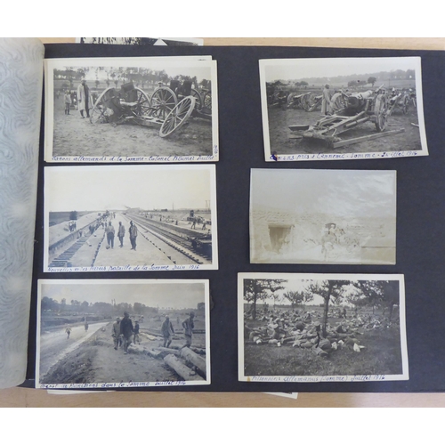 367 - Two albums of mainly 20thC monochrome photographs: to include military, academic, sport and period F... 