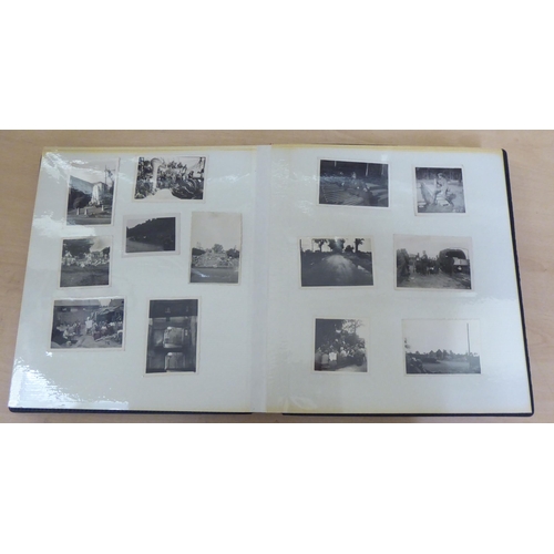 367 - Two albums of mainly 20thC monochrome photographs: to include military, academic, sport and period F... 