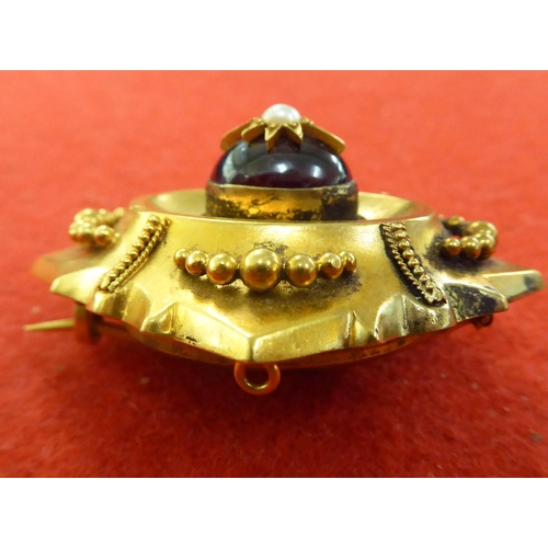 371 - A late Victorian yellow metal garnet and pearl set brooch