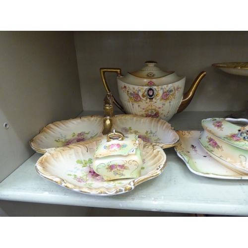 389 - Late Victorian Crown Devon china tableware, decorated with flora