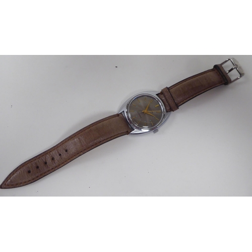 398 - A Favre-Leube Sandow stainless steel cased wristwatch, faced by a baton dial, on a tan hide strap