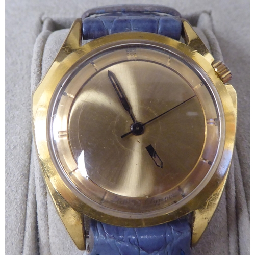 404 - A Zodiac Mystery gold plated and stainless steel cased automatic wristwatch, faced by a baton dial, ... 