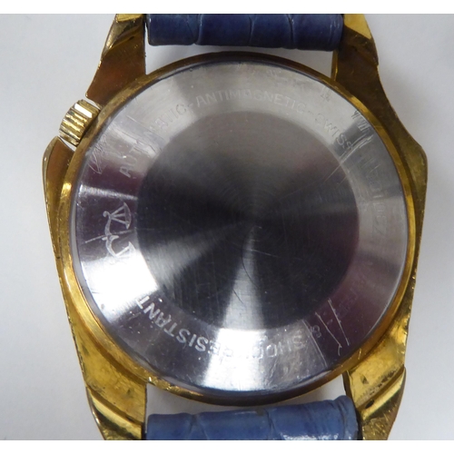 404 - A Zodiac Mystery gold plated and stainless steel cased automatic wristwatch, faced by a baton dial, ... 