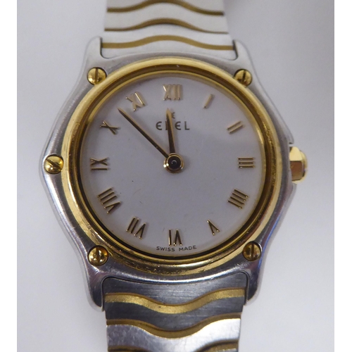 406 - A lady's Ebel 1911 bi-coloured stainless steel cased bracelet wristwatch, faced by a Roman dial