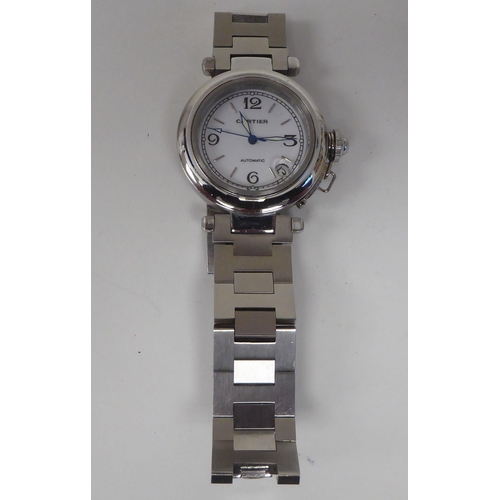 411 - A stainless steel cased automatic bracelet wristwatch, faced by an Arabic and baton dial, incorporat... 