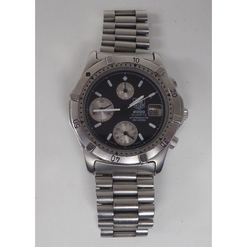 424 - A Tag Heuer 2000 Quartz Professional 200m stainless steel cased bracelet chronograph, the dial with ... 