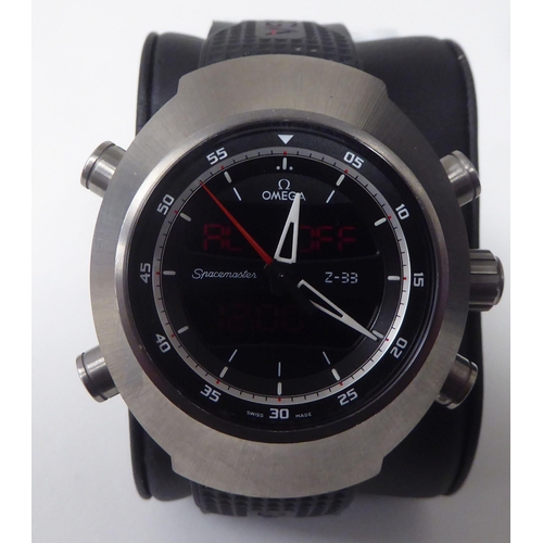 432 - An Omega Z33 Spacemaster brushed stainless steel cased bracelet wristwatch, the black dial with an i... 