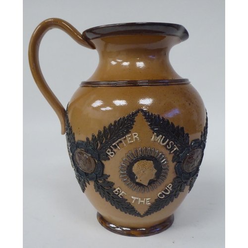 45 - A late Victorian Doulton Lambeth brown and green glazed stoneware, ovoid shape jug, decorated in mou... 