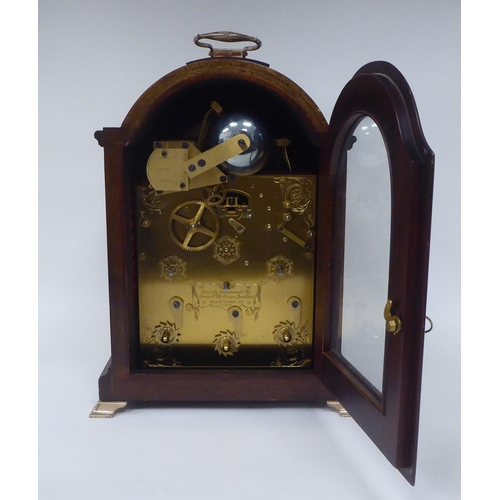 70 - A Queen Elizabeth II Silver Jubilee mahogany cased bracket clock, commissioned by Garrard, designed ... 