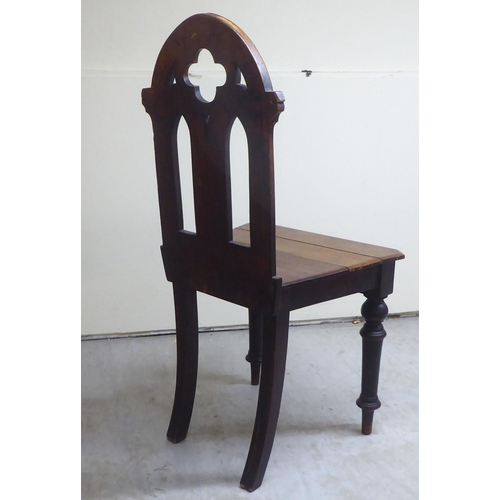 80 - Five items of 19thC and later small furniture: to include a mahogany framed ecclesiastical style hal... 