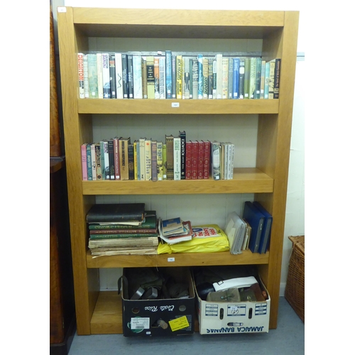 85 - A modern light oak finished four tier open bookcase, on a plinth  71