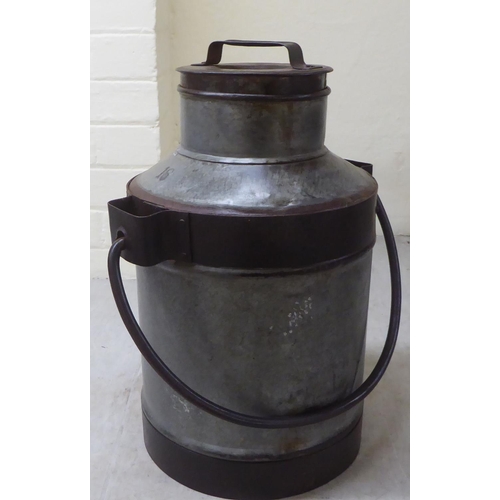 102 - A galvanised metal milk churn  16