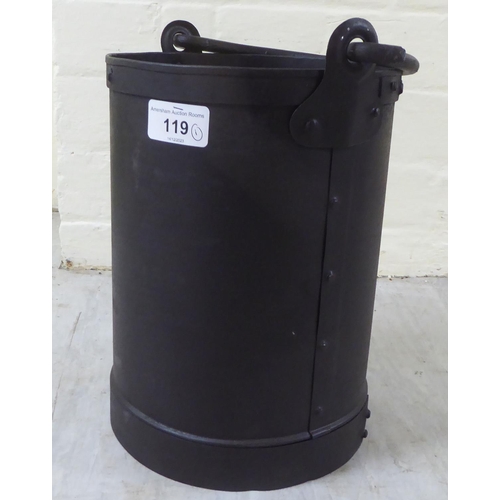 119 - A rivetted cast metal cylindrical bucket