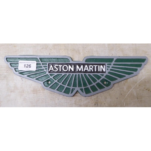 126 - A cast iron sign 'Aston Martin'  12