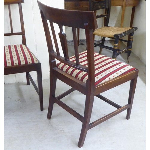 127 - A set of four late George III Sheraton design mahogany framed dining chairs, the later fabric covere... 