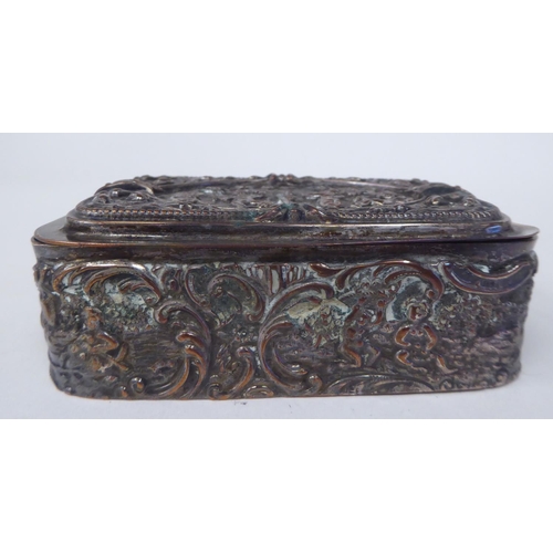 129 - A 19thC silver plated casket with straight sides and a hinged lid, embossed in classical taste with ... 